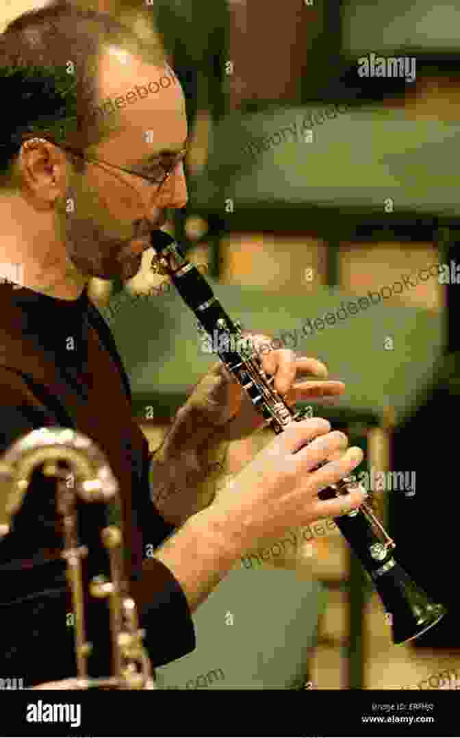 A Close Up Image Of A Flat Clarinet Being Played By A Musician. Yamaha Band Student 1: B Flat Clarinet (Yamaha Band Method)
