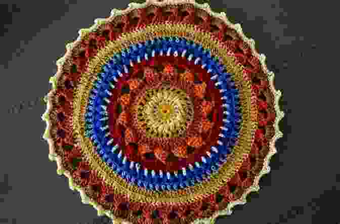 A Crocheted Sunburst Mandala In Bright Colors. 20 To Crochet: Crocheted Mandalas (Twenty To Make)